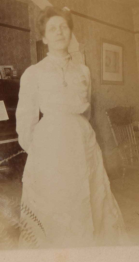 Lot 064 - Antique Snapshot Photo Album Scrapbook Contained In A Record Ledger With 40+ Photos And Scraps, With Handwritten Enscriptions, Including Interior Photos, Outdoor Photos, And More, Circa 1900, Hand Drawn Flower Scraps