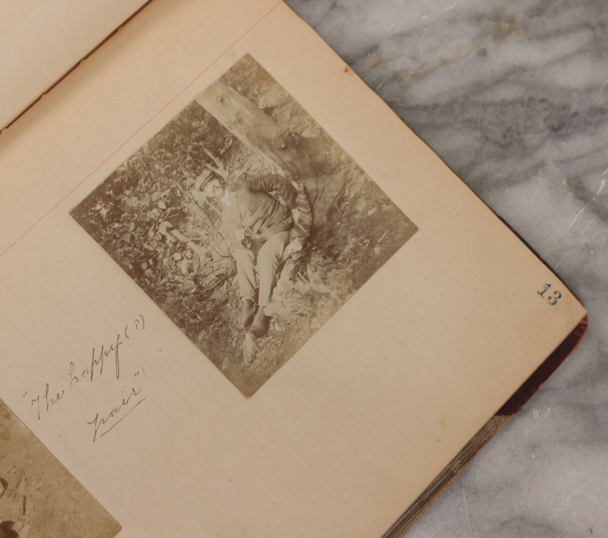 Lot 064 - Antique Snapshot Photo Album Scrapbook Contained In A Record Ledger With 40+ Photos And Scraps, With Handwritten Enscriptions, Including Interior Photos, Outdoor Photos, And More, Circa 1900, Hand Drawn Flower Scraps