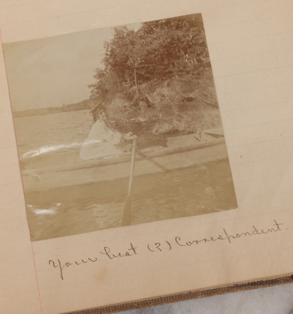 Lot 064 - Antique Snapshot Photo Album Scrapbook Contained In A Record Ledger With 40+ Photos And Scraps, With Handwritten Enscriptions, Including Interior Photos, Outdoor Photos, And More, Circa 1900, Hand Drawn Flower Scraps