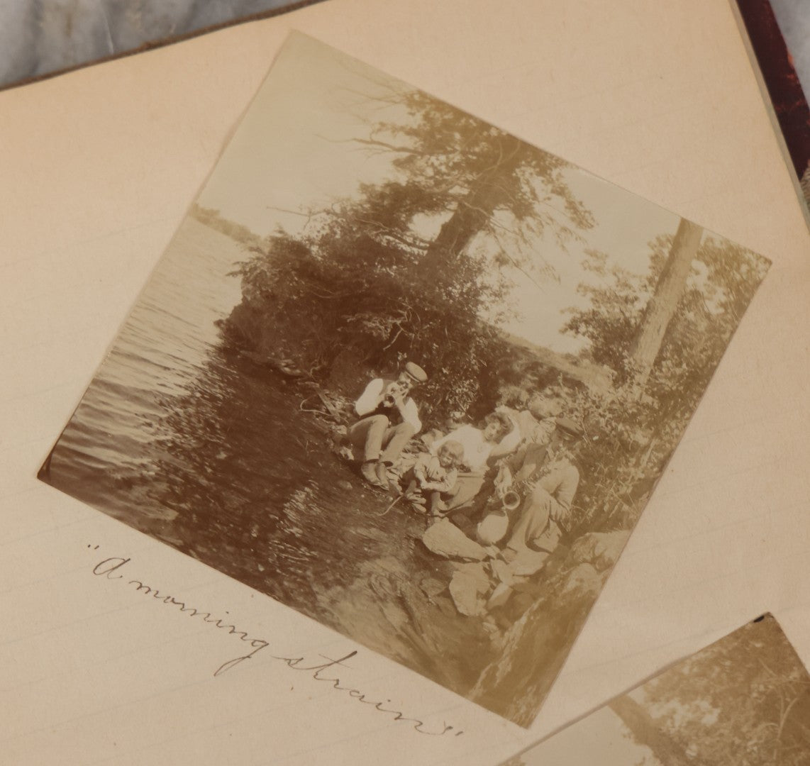 Lot 064 - Antique Snapshot Photo Album Scrapbook Contained In A Record Ledger With 40+ Photos And Scraps, With Handwritten Enscriptions, Including Interior Photos, Outdoor Photos, And More, Circa 1900, Hand Drawn Flower Scraps