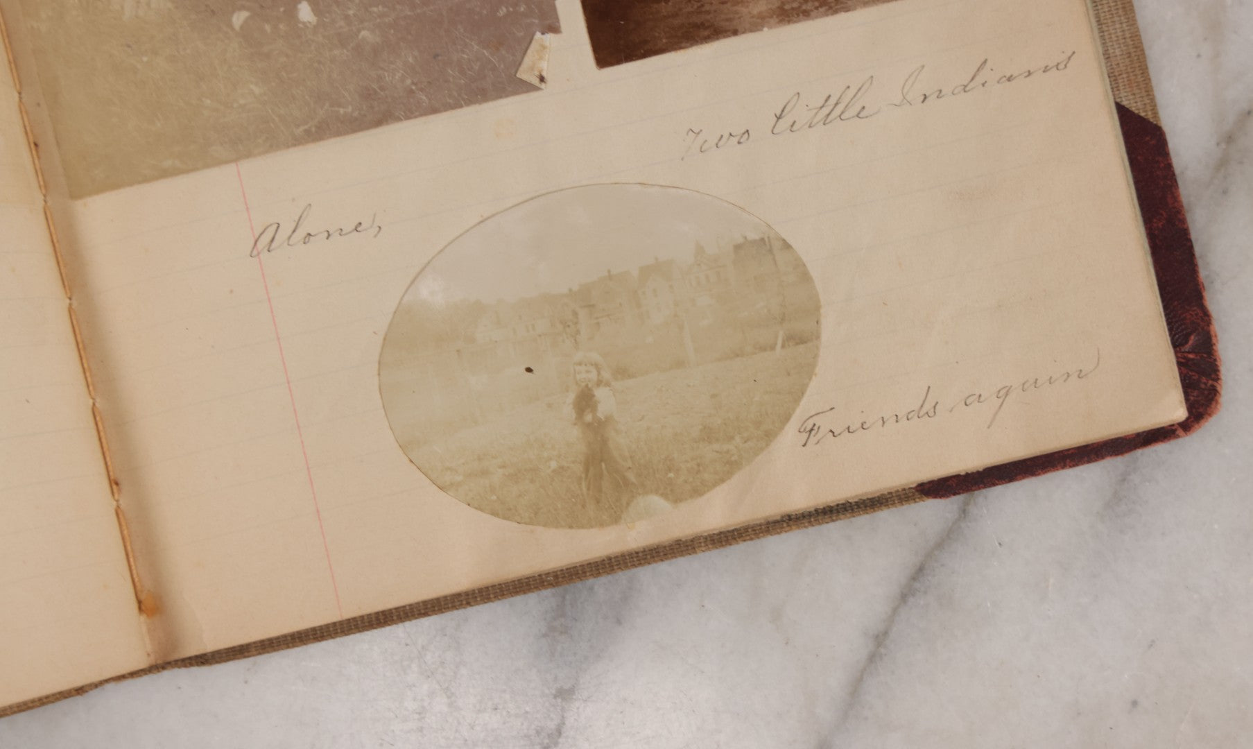 Lot 064 - Antique Snapshot Photo Album Scrapbook Contained In A Record Ledger With 40+ Photos And Scraps, With Handwritten Enscriptions, Including Interior Photos, Outdoor Photos, And More, Circa 1900, Hand Drawn Flower Scraps