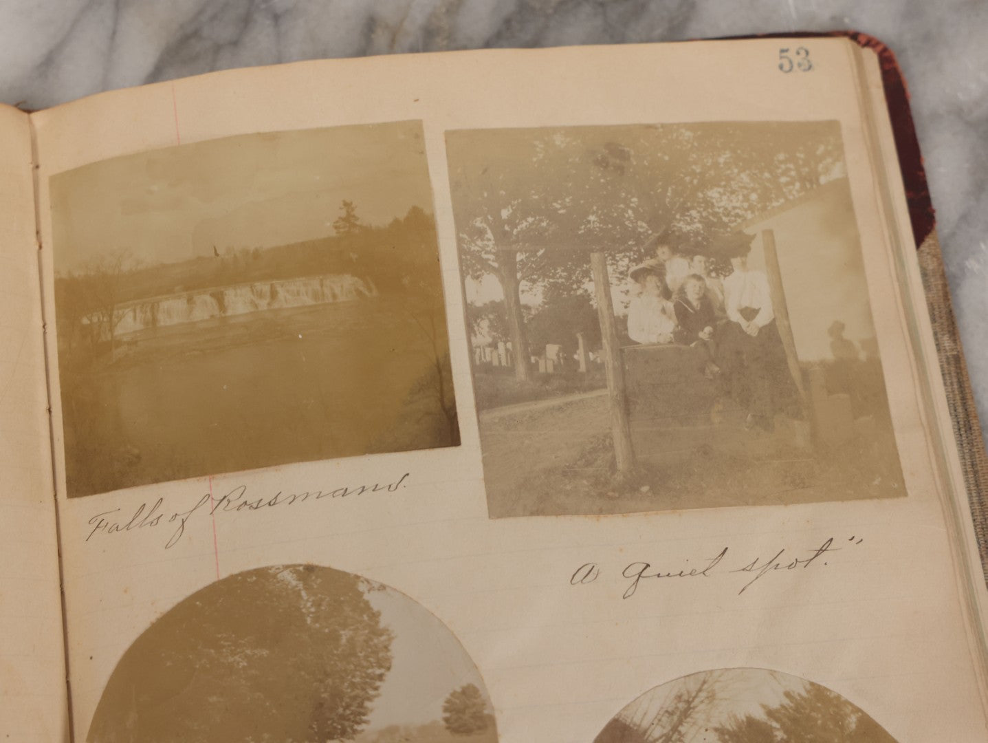 Lot 064 - Antique Snapshot Photo Album Scrapbook Contained In A Record Ledger With 40+ Photos And Scraps, With Handwritten Enscriptions, Including Interior Photos, Outdoor Photos, And More, Circa 1900, Hand Drawn Flower Scraps