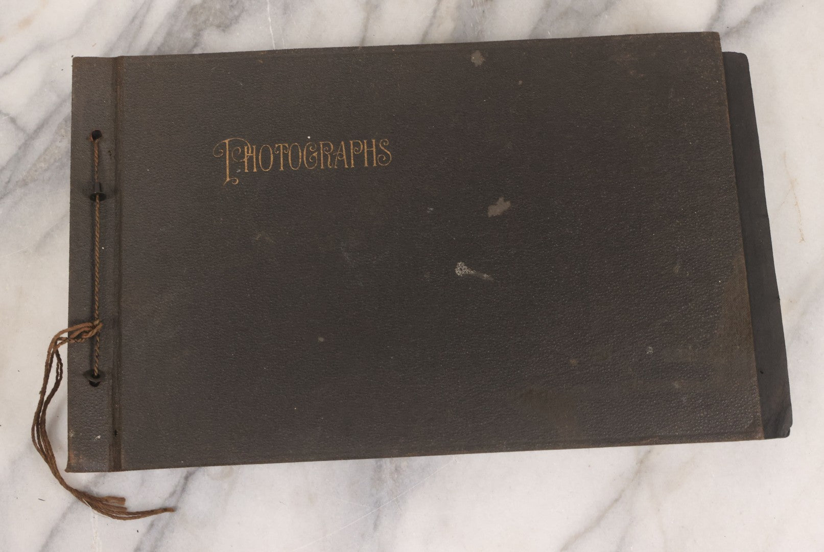 Lot 065 - Vintage Snapshot Photo Album With 95+ Photographs Of The Men And Women Of The 1920s Including Many Photos Of Lakeside Gatherings, Flappers, Swimsuits, And WWI Era Soldiers