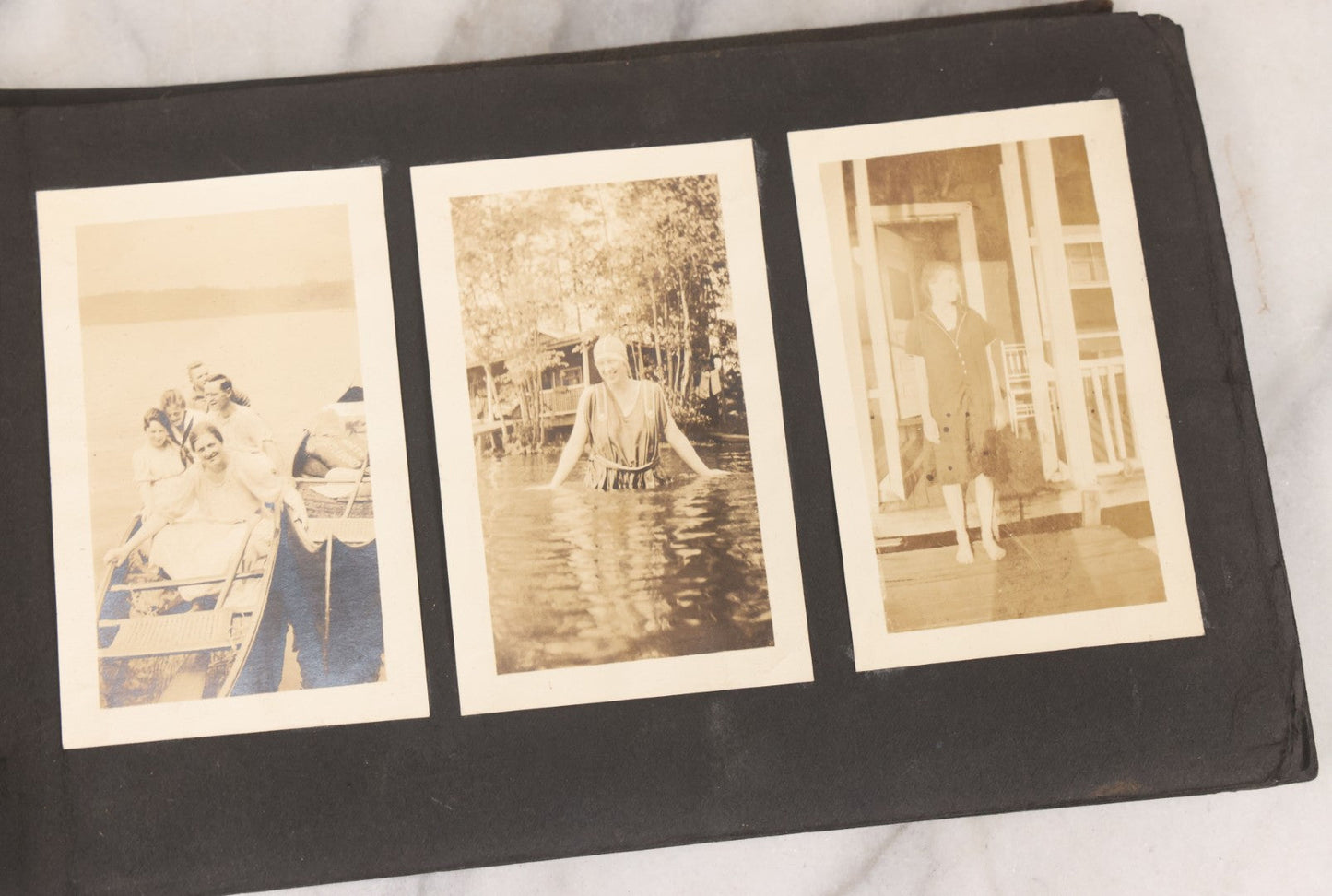 Lot 065 - Vintage Snapshot Photo Album With 95+ Photographs Of The Men And Women Of The 1920s Including Many Photos Of Lakeside Gatherings, Flappers, Swimsuits, And WWI Era Soldiers