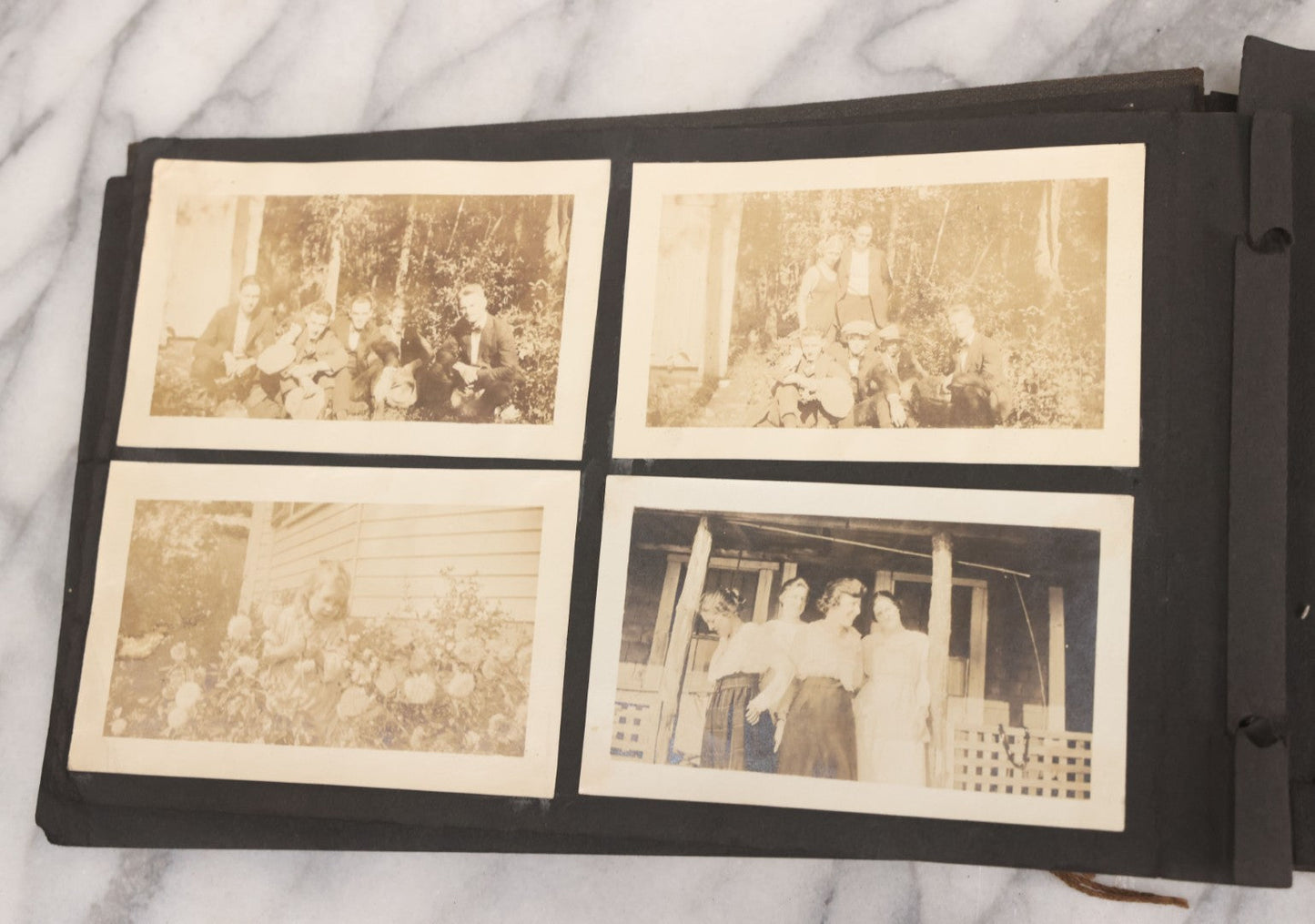 Lot 065 - Vintage Snapshot Photo Album With 95+ Photographs Of The Men And Women Of The 1920s Including Many Photos Of Lakeside Gatherings, Flappers, Swimsuits, And WWI Era Soldiers