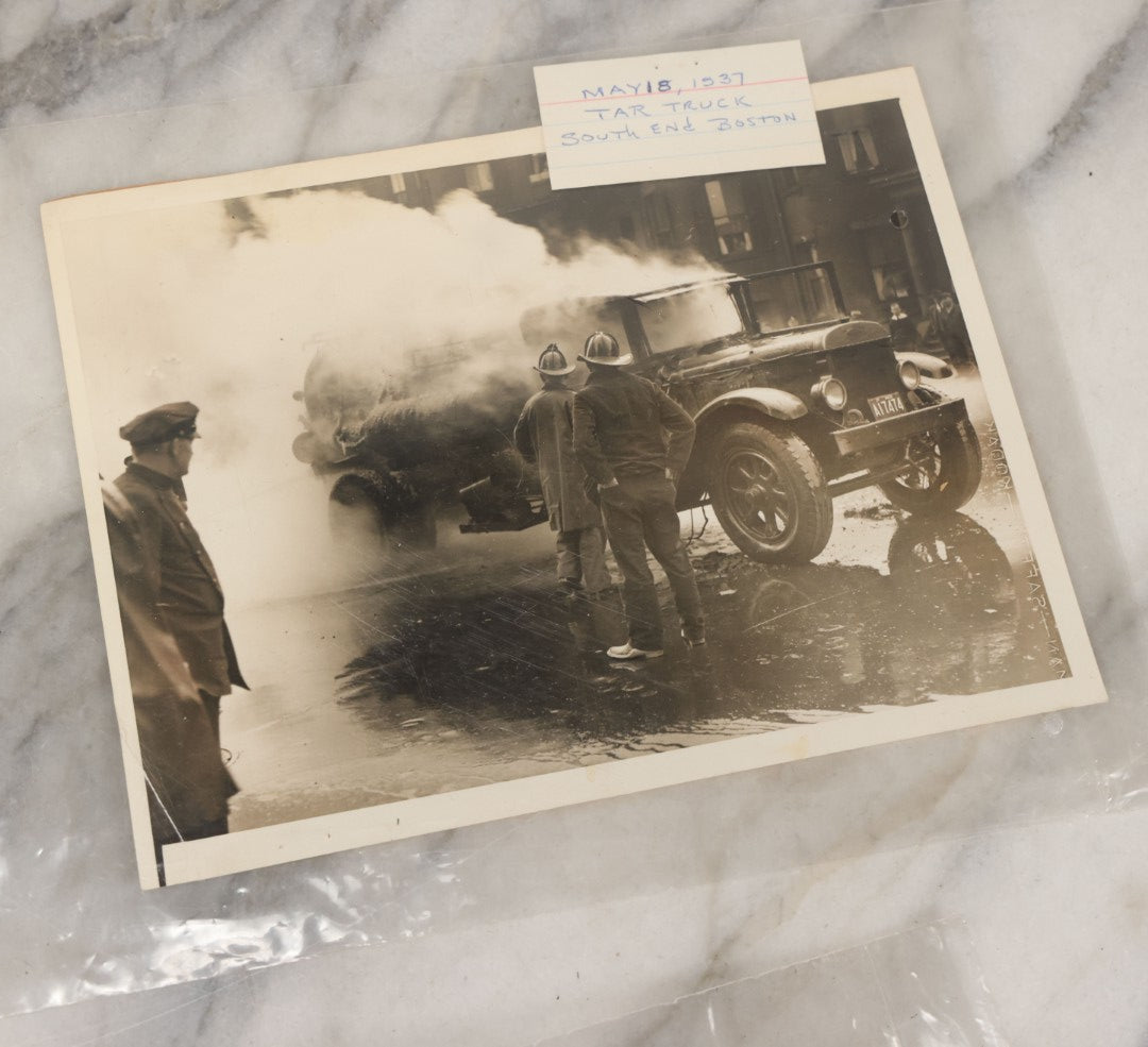 Lot 001 - Extensive Grouping Of 100+ Documentary Press Photos Of Firefighters Battling Fires, Aftermath And Destruction, And Firefighting Apperatus, In And Around The City Of Boston, Late 1930s To 1950s, With Notes Regarding Date And Location, 9" x 7"