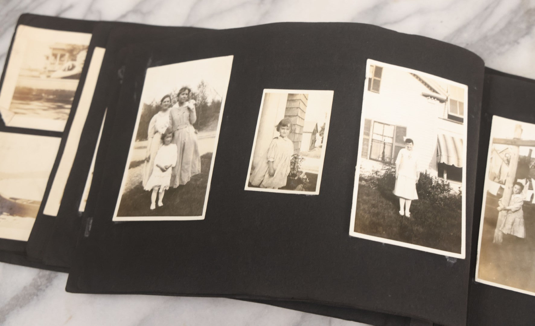 Lot 065 - Vintage Snapshot Photo Album With 95+ Photographs Of The Men And Women Of The 1920s Including Many Photos Of Lakeside Gatherings, Flappers, Swimsuits, And WWI Era Soldiers