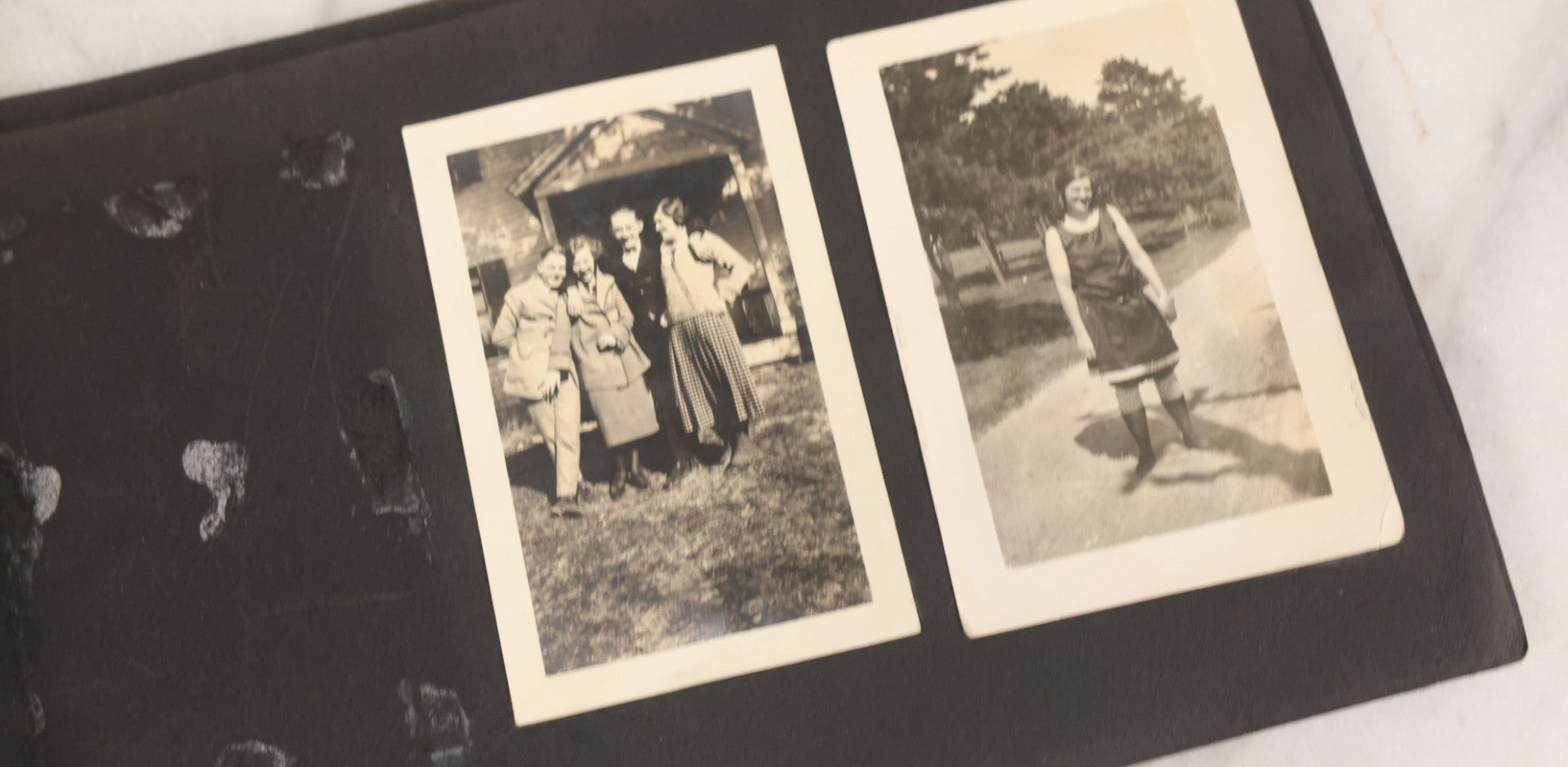 Lot 065 - Vintage Snapshot Photo Album With 95+ Photographs Of The Men And Women Of The 1920s Including Many Photos Of Lakeside Gatherings, Flappers, Swimsuits, And WWI Era Soldiers