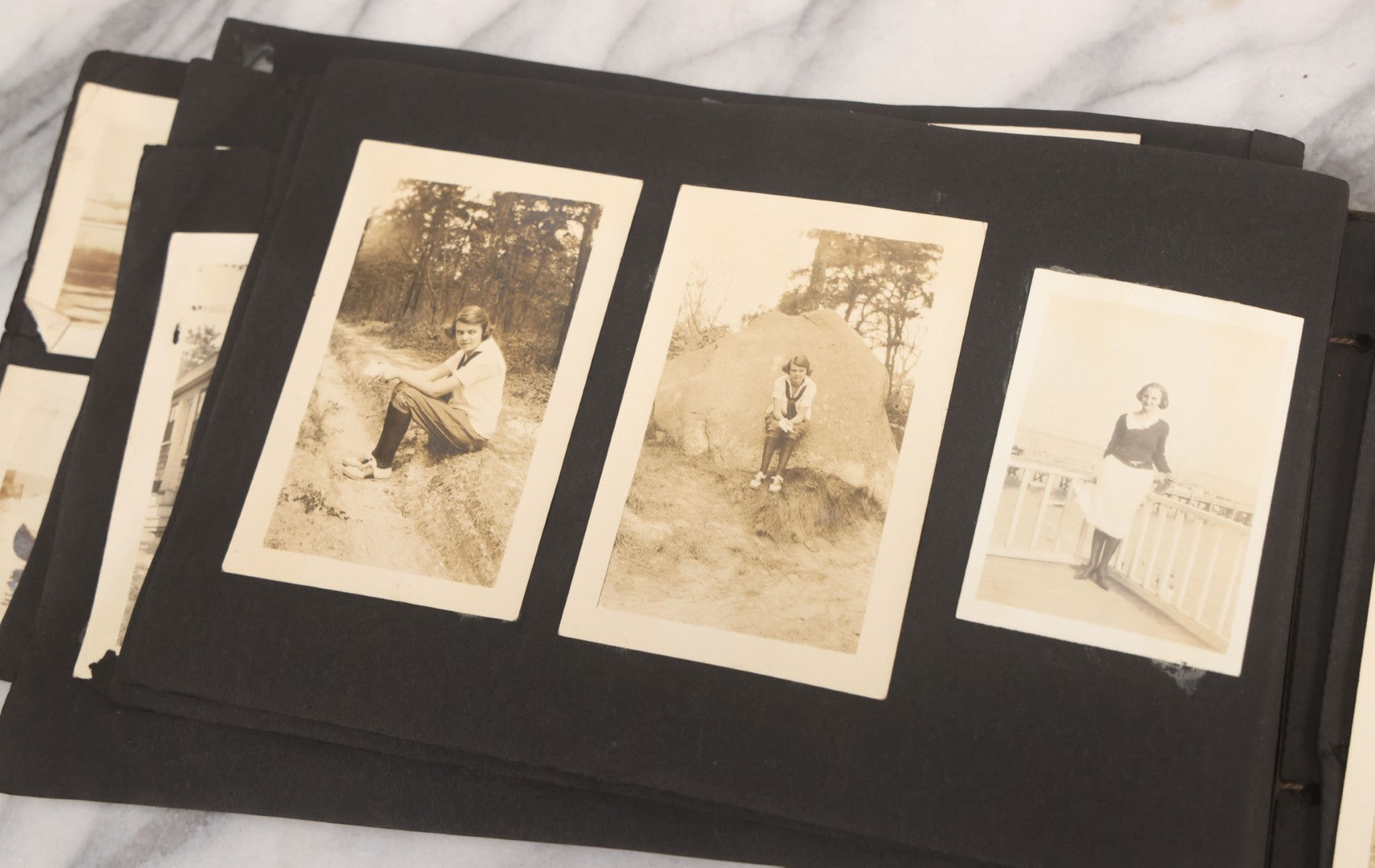 Lot 065 - Vintage Snapshot Photo Album With 95+ Photographs Of The Men And Women Of The 1920s Including Many Photos Of Lakeside Gatherings, Flappers, Swimsuits, And WWI Era Soldiers