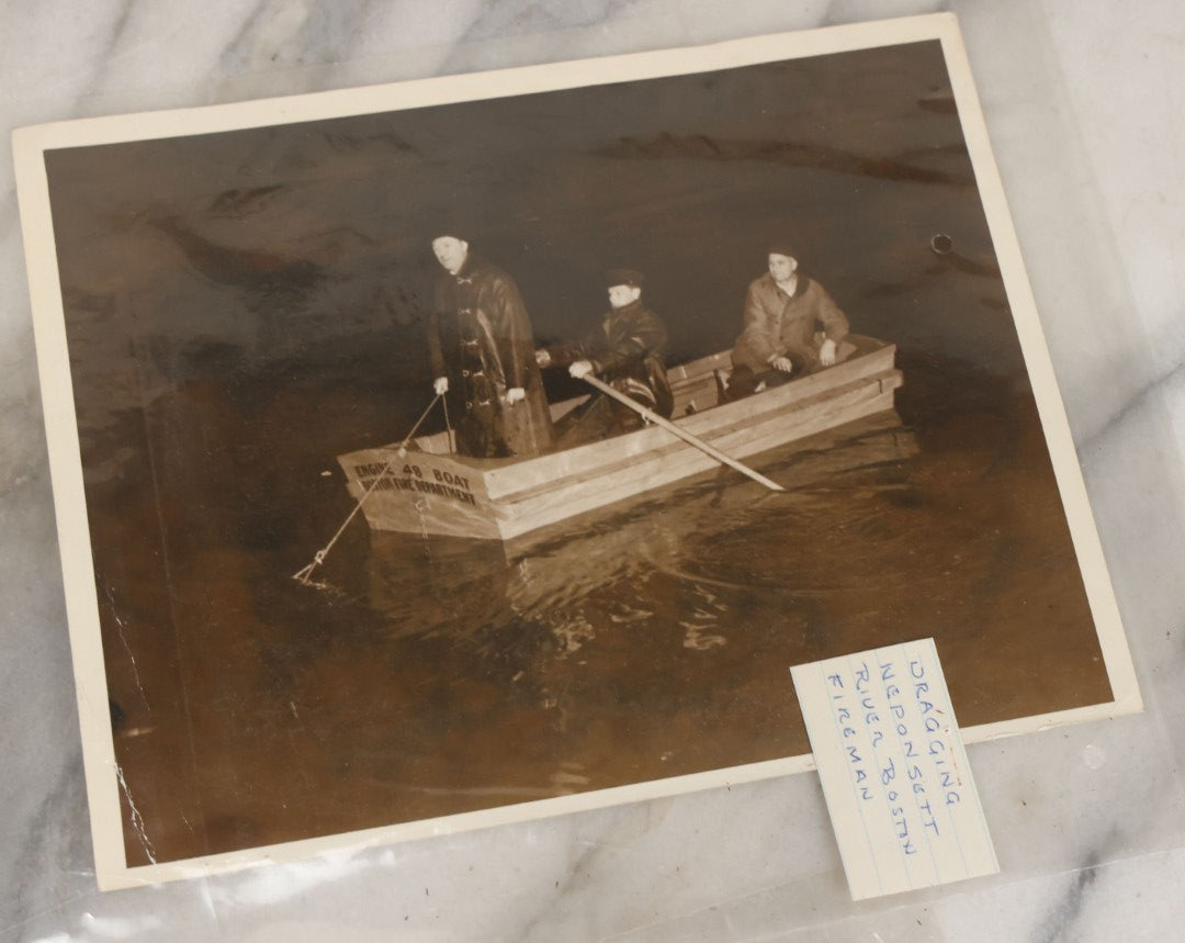 Lot 001 - Extensive Grouping Of 100+ Documentary Press Photos Of Firefighters Battling Fires, Aftermath And Destruction, And Firefighting Apperatus, In And Around The City Of Boston, Late 1930s To 1950s, With Notes Regarding Date And Location, 9" x 7"