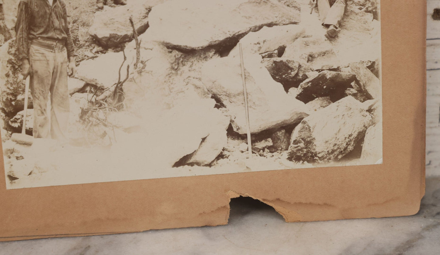 Lot 067 - Antique Boarded Occupational Photograph Of Group Of Seven Miners Posing In Quarry, Holding Sledgehammers And Other Tools