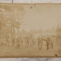 Lot 068 - Antique Boarded Occupational Photograph Of Group Of Lumber Workers Posing At A Lumber Camp In Mifflin County, Pennsylvania, Partial Identification On Verso Of "Grandpa Hoff", Bicycle And Horse In Photo, Note Cracking And Wear
