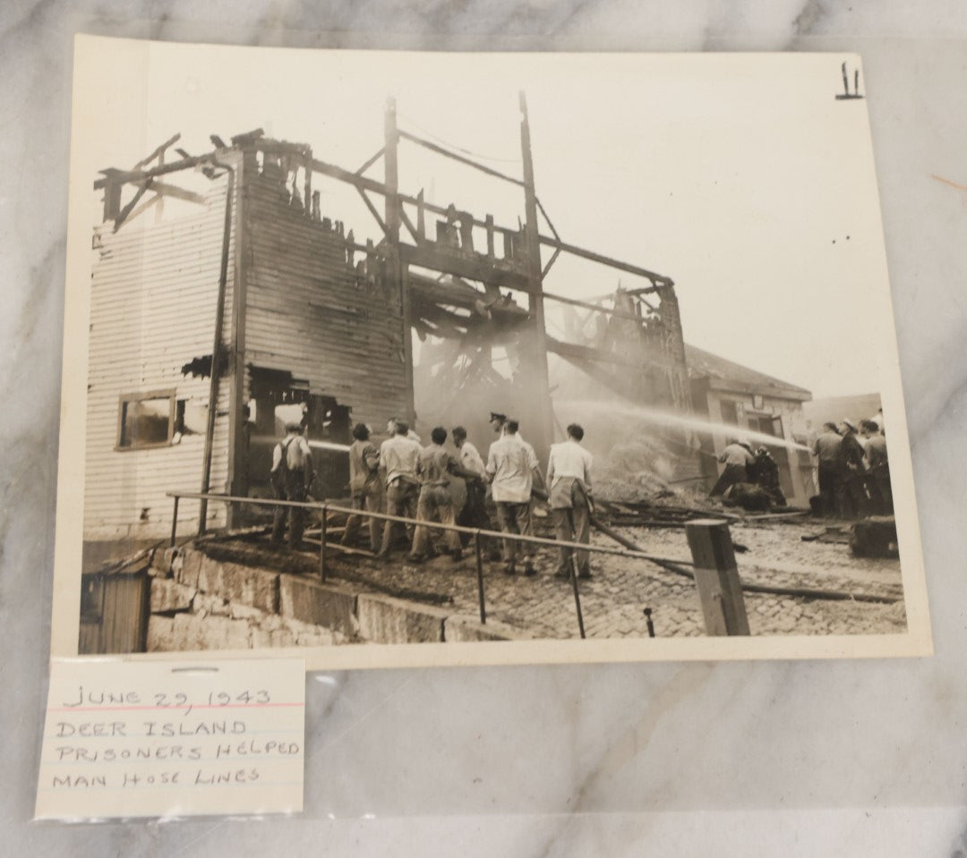 Lot 001 - Extensive Grouping Of 100+ Documentary Press Photos Of Firefighters Battling Fires, Aftermath And Destruction, And Firefighting Apperatus, In And Around The City Of Boston, Late 1930s To 1950s, With Notes Regarding Date And Location, 9" x 7"