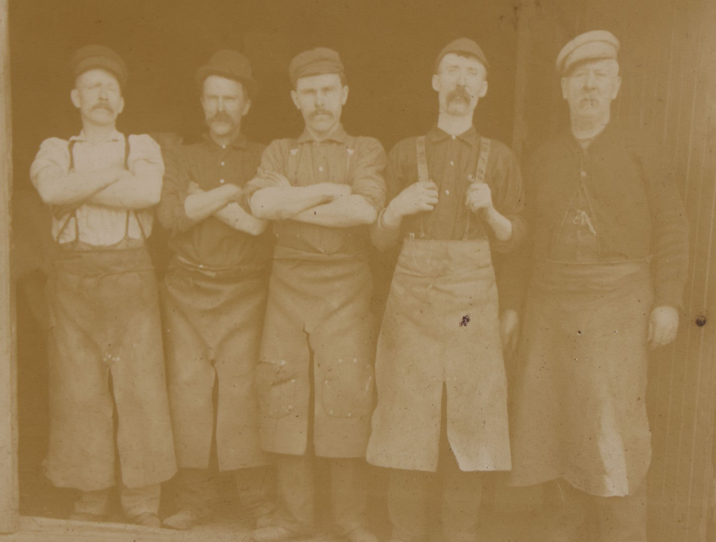 Lot 070 - Antique Flush Mount Boarded Occupational Photograph Of Group Of Five Burly Workers Posing In A Doorway, James A. Phinney Identified, Boston Photographer Mark On Verso