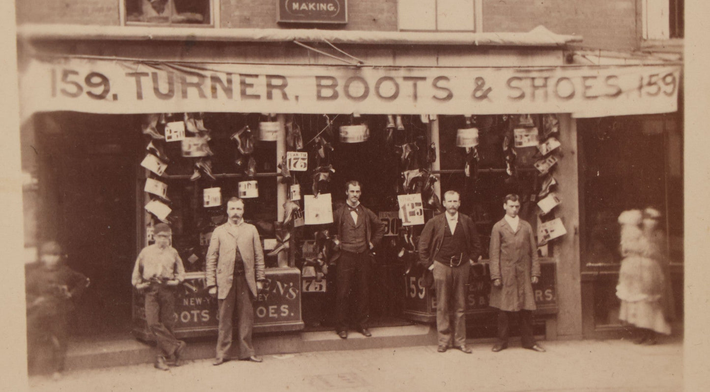 Lot 073 - Antique Cabinet Card Photograph Of The Workers And Proprietors Posing Outside Of The Storefront Of Turner Boots & Shoes And A.J. Smith Dress And Cloakmaking, New York