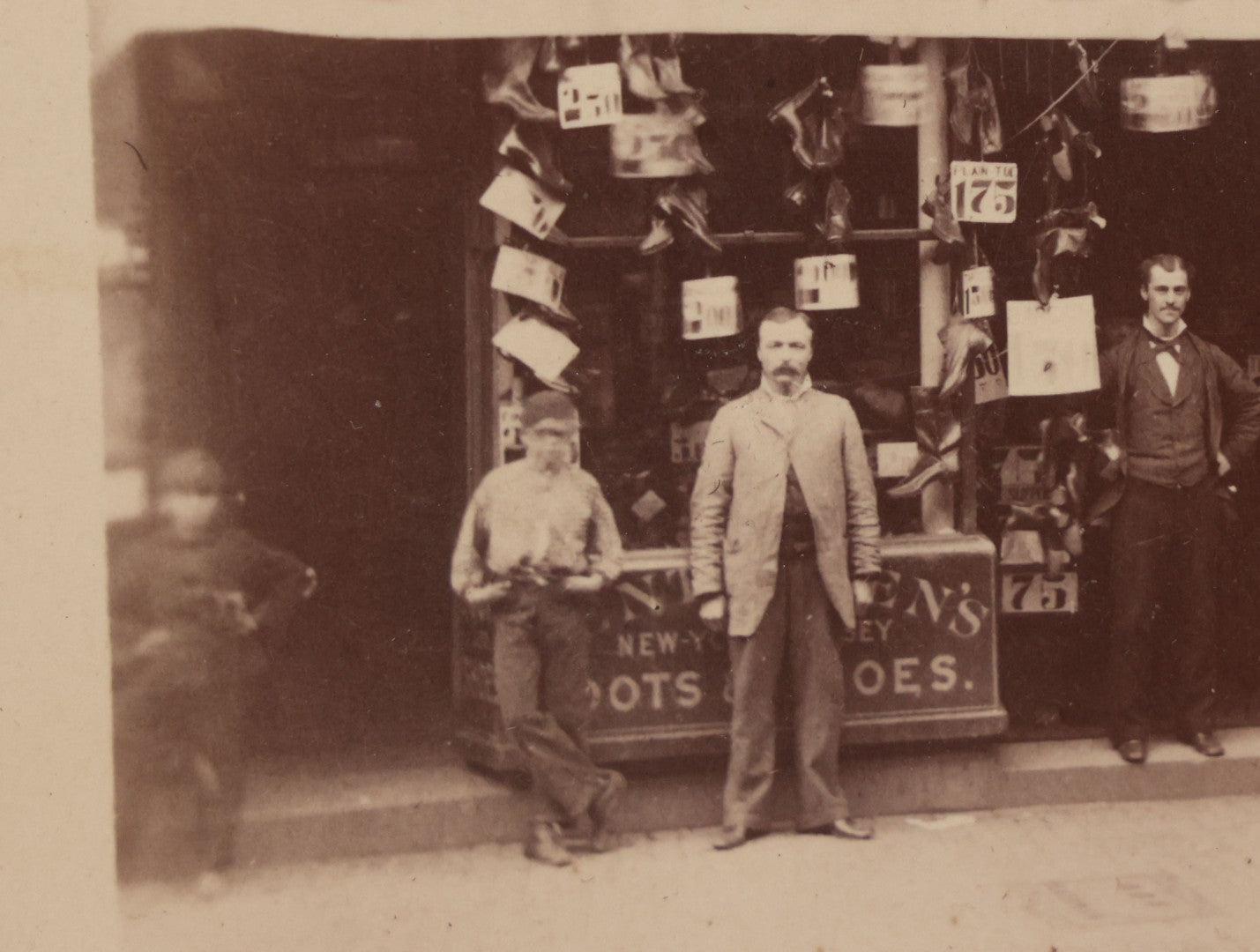 Lot 073 - Antique Cabinet Card Photograph Of The Workers And Proprietors Posing Outside Of The Storefront Of Turner Boots & Shoes And A.J. Smith Dress And Cloakmaking, New York