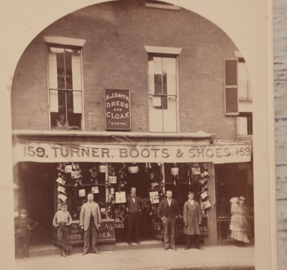 Lot 073 - Antique Cabinet Card Photograph Of The Workers And Proprietors Posing Outside Of The Storefront Of Turner Boots & Shoes And A.J. Smith Dress And Cloakmaking, New York