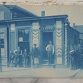 Lot 074 - Antique Unmounted Cyanotype Photograph Of The Workers And Proprietors Posing Outside Of The Storefronts Of L. DeLorme "Ladies And Gents Haircutting And Shampooing" And Dupont The Tailor, Harry Holland, Photographer, Worcester, Massachusetts