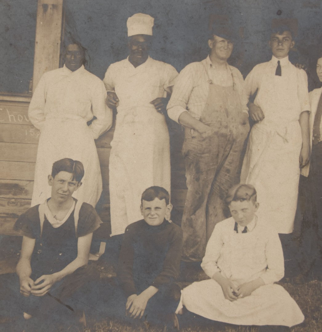 Lot 075 - Antique Boarded Occupational Photograph Of Cooks And Workers Outside Chow Hall, With Chow Hall In Background Featuring Several Moxie Soda Advertisements