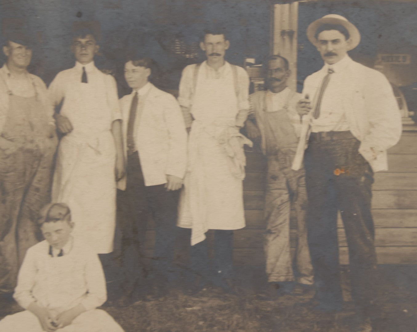 Lot 075 - Antique Boarded Occupational Photograph Of Cooks And Workers Outside Chow Hall, With Chow Hall In Background Featuring Several Moxie Soda Advertisements