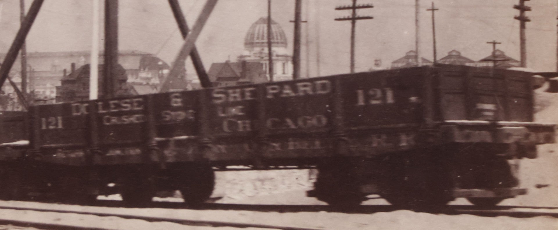 Lot 078 - Antique Boarded Photograph Of Two Train Cars On Tracks With Advertising For Dolese & Shepard, Chicago And Other Lettering, In Front Of Chicago Worlds Fair Buildings, Dame, Stoddard & Kendall, Developers, Boston