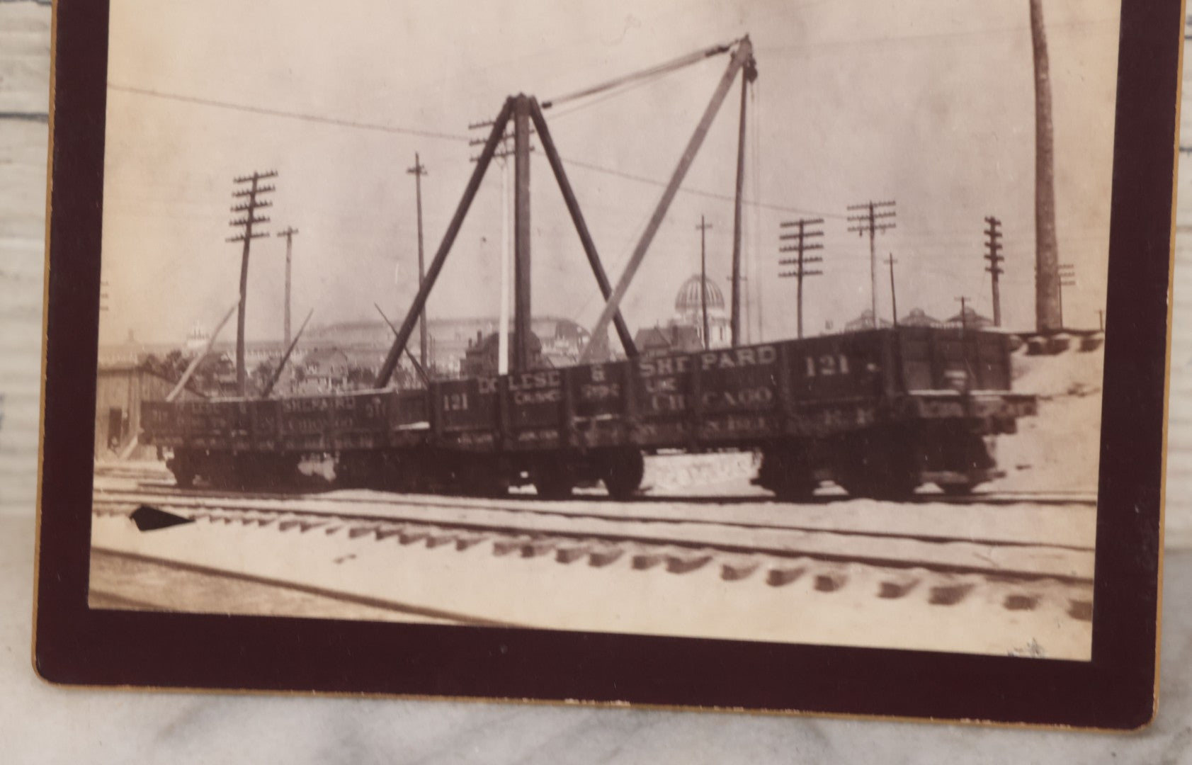 Lot 078 - Antique Boarded Photograph Of Two Train Cars On Tracks With Advertising For Dolese & Shepard, Chicago And Other Lettering, In Front Of Chicago Worlds Fair Buildings, Dame, Stoddard & Kendall, Developers, Boston