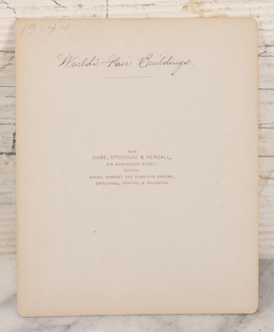 Lot 078 - Antique Boarded Photograph Of Two Train Cars On Tracks With Advertising For Dolese & Shepard, Chicago And Other Lettering, In Front Of Chicago Worlds Fair Buildings, Dame, Stoddard & Kendall, Developers, Boston