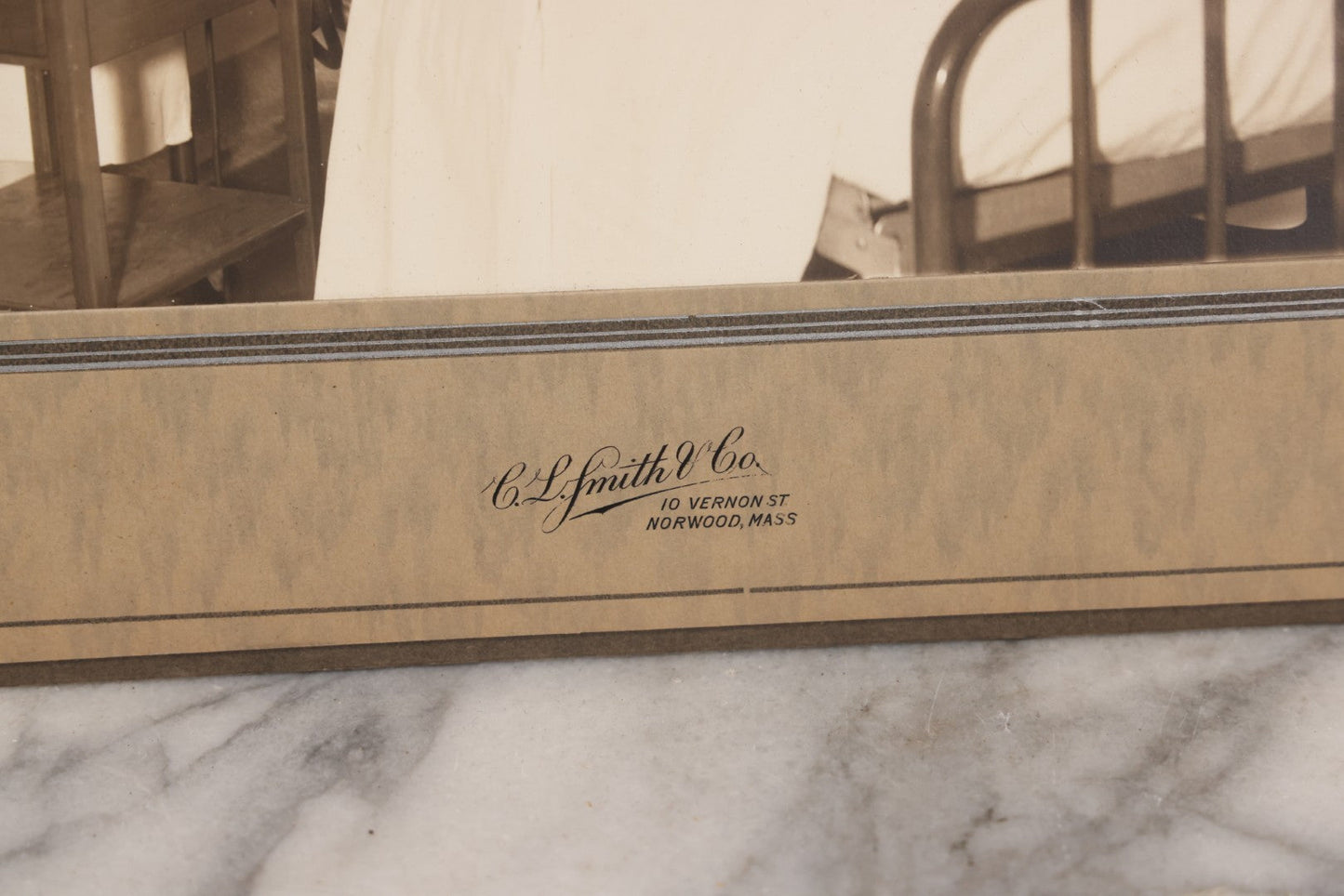 Lot 080 - Vintage Photograph In Paper Frame Of Woman In Hospital Bed With Her Nurse And Doctor About To Utilize An Unknown Medical Apperatus, C.L. Smith & Co., Photographers, Norwood, Massachusetts