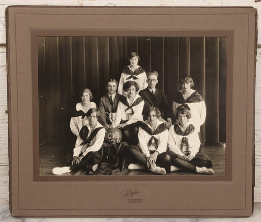 Lot 095 - Vintage Photograph In Paper Frame Of Girls Basketball Team Posing With Coaches, Trophy, And Basketball Marked C.H.S. 1926, Likely Catawissa High School, Phillips, Photographer, Bloomsburg, Eagles-Mere, & Danville, Pennsylvania 