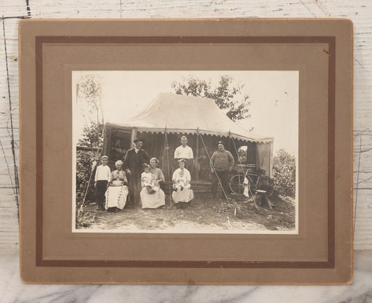 Lot 105 - Antique Boarded Photograph Of Three Generations Of Men Women And Children Posing Outside Of Tent, With Bicycle In Photo