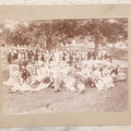 Lot 107 - Antique Double Sided Boarded Photograph Of Outing Of Fancy Dressed Men In White Pants, White Caps, With Ribbons And Their Wives