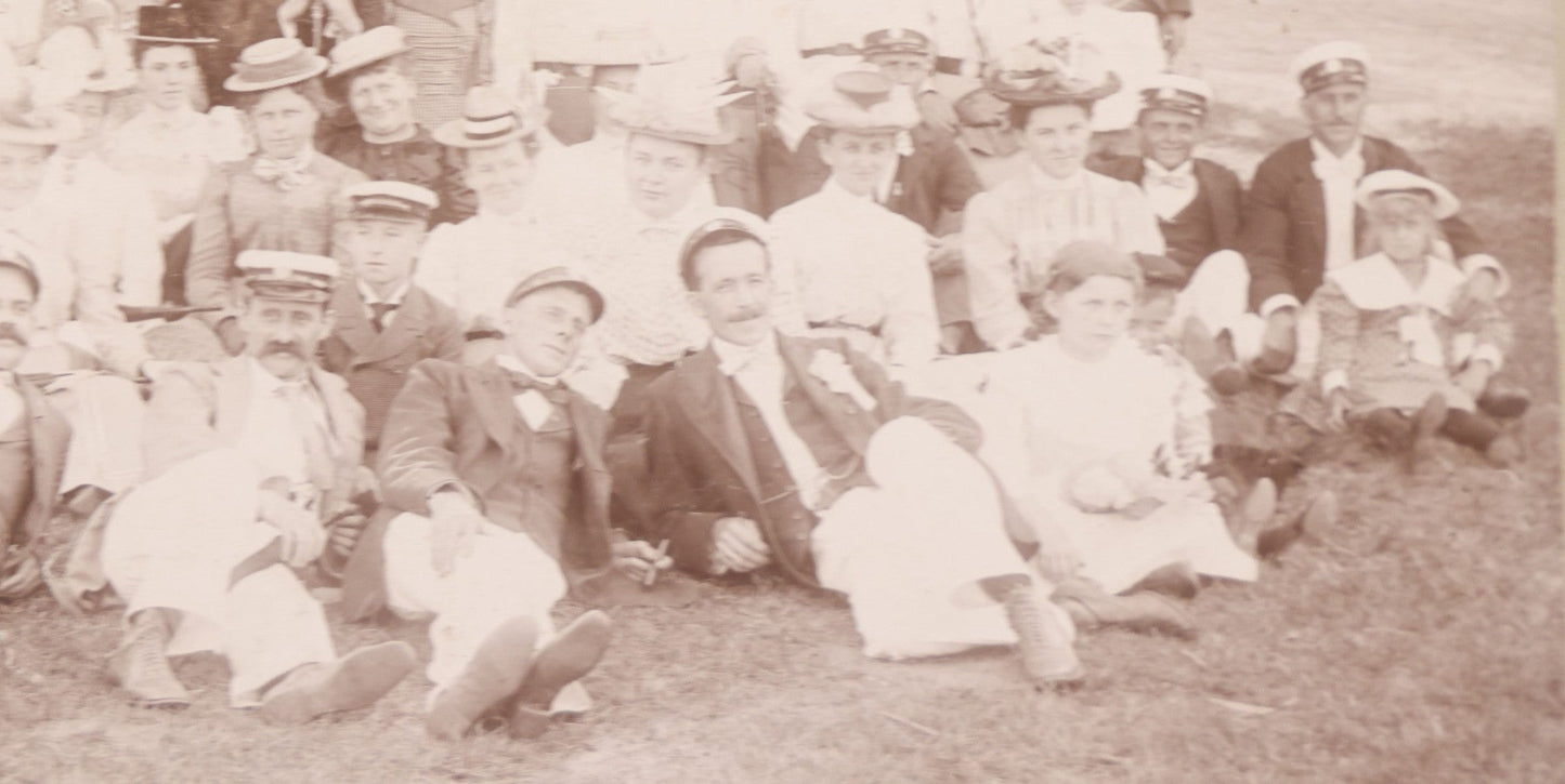Lot 107 - Antique Double Sided Boarded Photograph Of Outing Of Fancy Dressed Men In White Pants, White Caps, With Ribbons And Their Wives