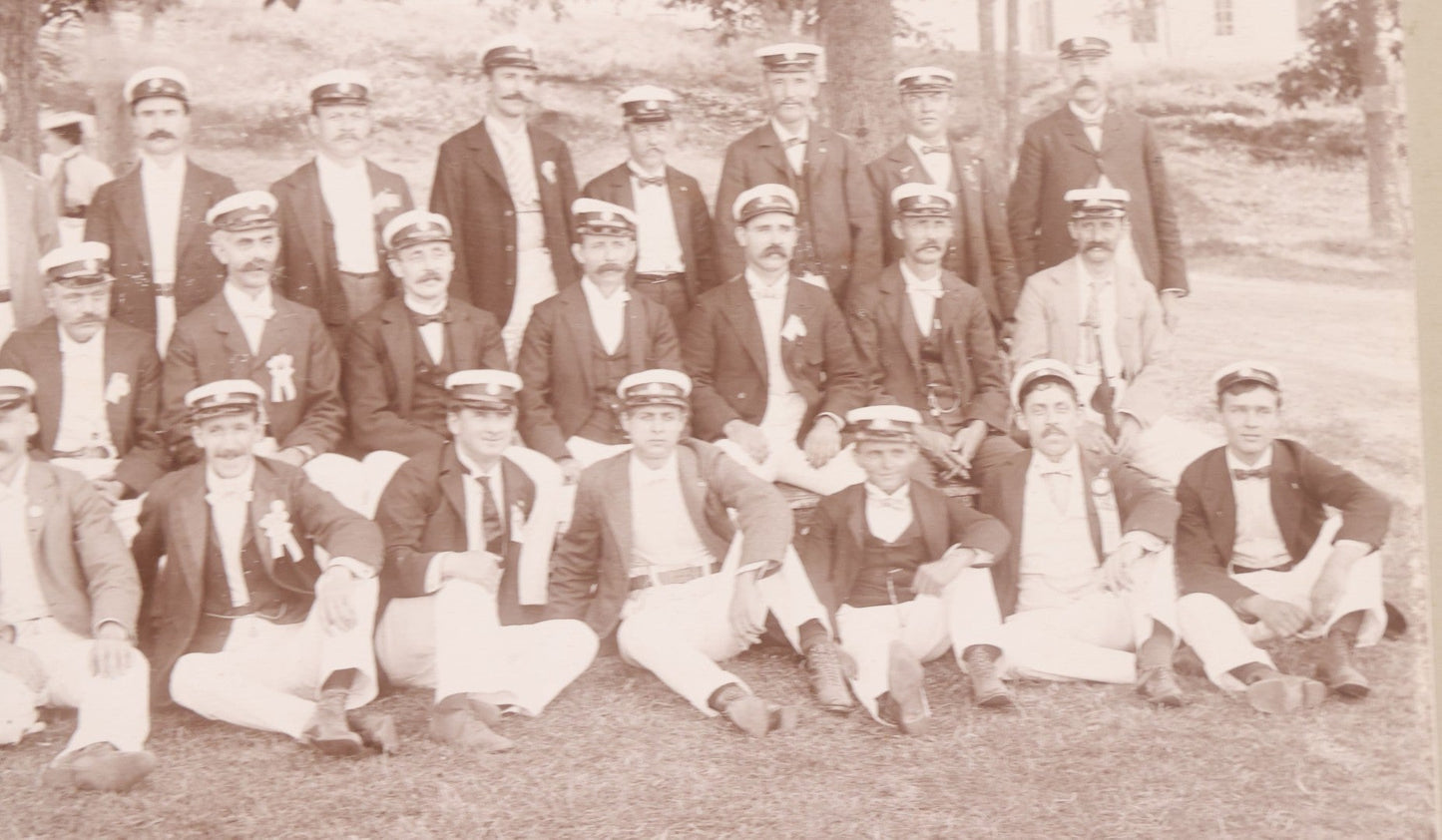 Lot 107 - Antique Double Sided Boarded Photograph Of Outing Of Fancy Dressed Men In White Pants, White Caps, With Ribbons And Their Wives