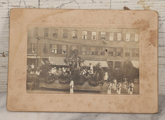 Lot 114 - Antique Boarded Photograph Of Patriotic Parade With Swedish Float With "Hoganas" Banner, Sign On Building "Bangs Block" (Likely Springfield, Mass.), Other Signs "Ball's Cigar Store", "Ladies & Gents Lounge", Barber Shop And "Sam Sing Laundry"