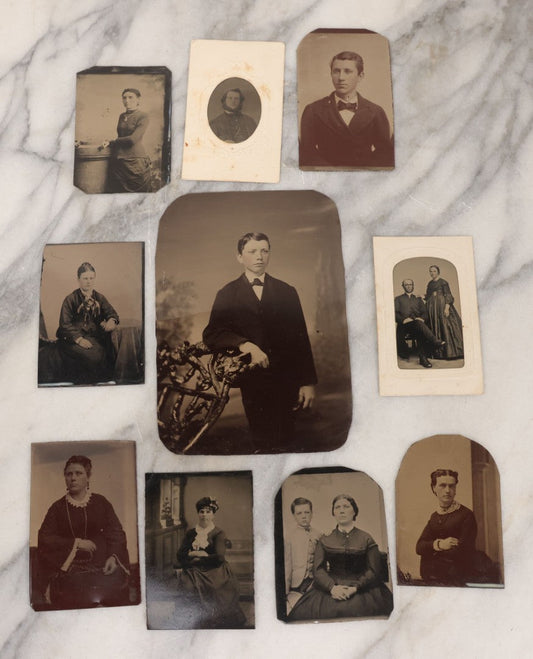 Lot 132 - Grouping Of Ten Antique Tintype Photographs Including Half Plate Of Boy Leaning Against Branch Chair, Young Man With Bowtie, Gaunt Woman With Jewelry, Middle Aged Couple, Mother And Son, And More