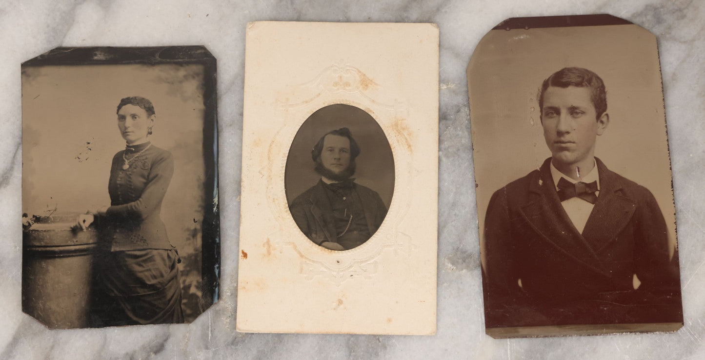 Lot 132 - Grouping Of Ten Antique Tintype Photographs Including Half Plate Of Boy Leaning Against Branch Chair, Young Man With Bowtie, Gaunt Woman With Jewelry, Middle Aged Couple, Mother And Son, And More
