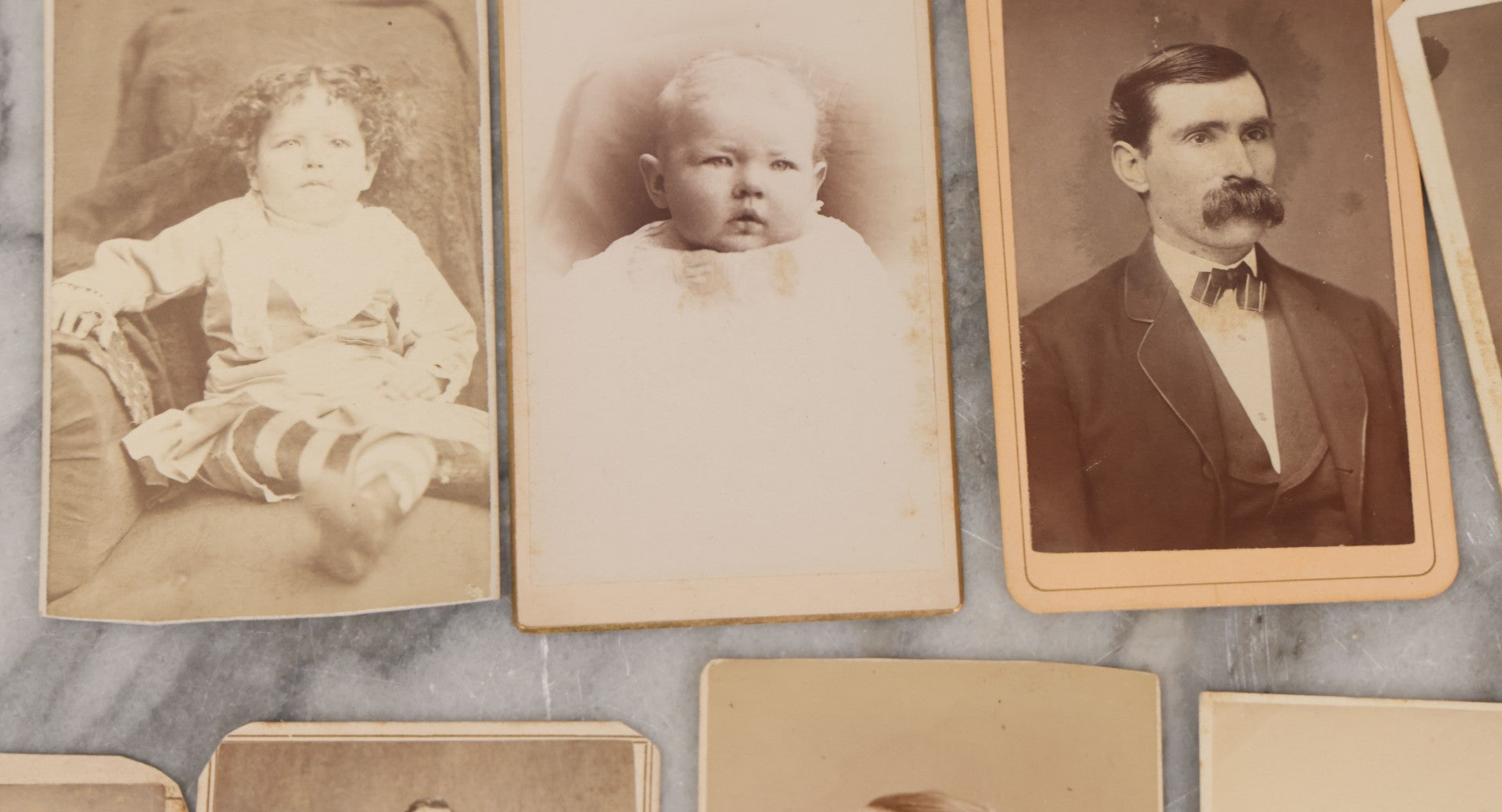 Lot 134 - Grouping Of 19 Antique Carte De Visite C.D.V. Photographs Including Pretty Woman With Long Blond Hair, Man With Mutton Chops, Little Girl Seated On Table, Incredulous Baby, Woman With Ruffled Collar, Man With Preposterous Mustache, And More