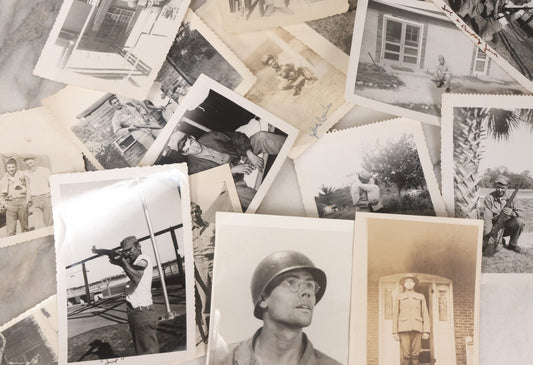 Lot 137 - Grouping Of 16 Post WWII Era Vintage Snapshot Photographs Of Soldiers Posing With Rifles, Goofing Off, And One Of Soldier Kissing His Lady