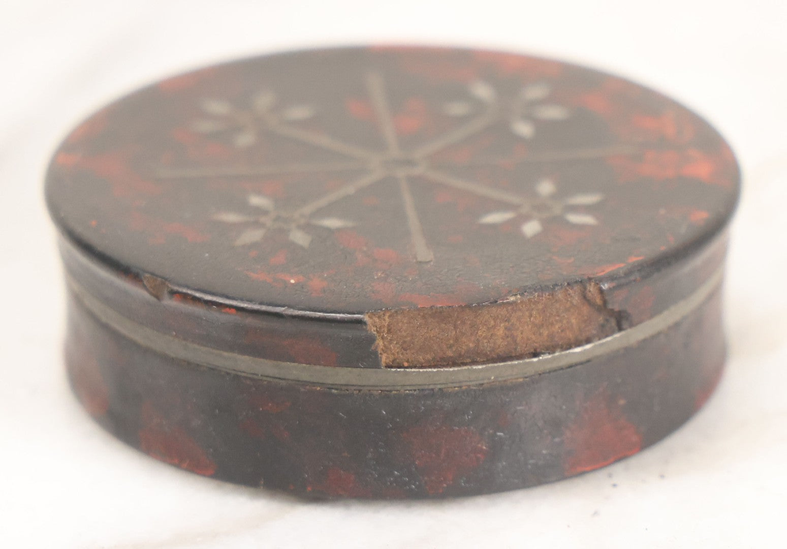 Lot 012 - Antique Laquered Papier Mache Dresser Box With Inlaid Geometric Cover And Red Paint Marbling, Note Loss To Edge Of Lid