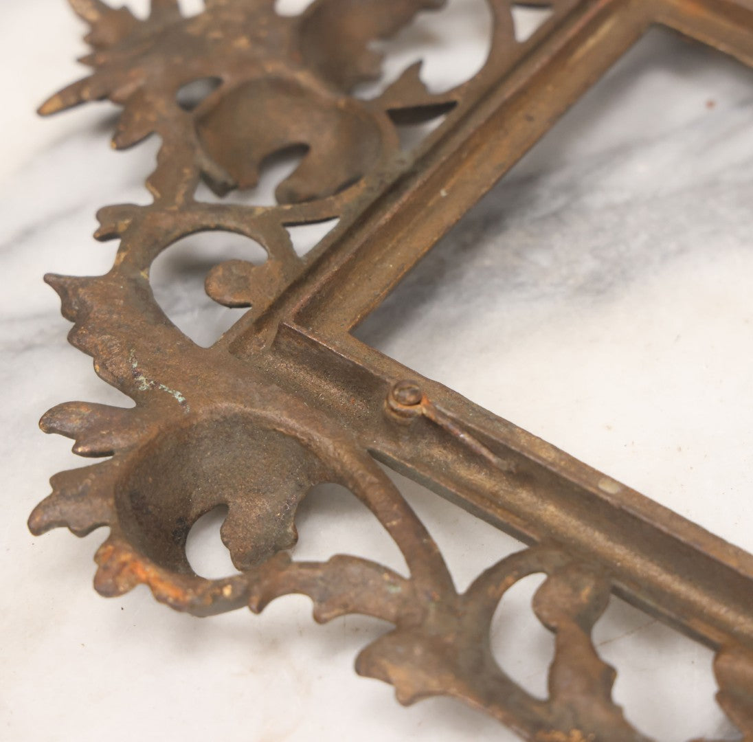 Lot 019 - Antique Ornate Gold Painted Cast Metal Rococco Style Frame With Folding Stand