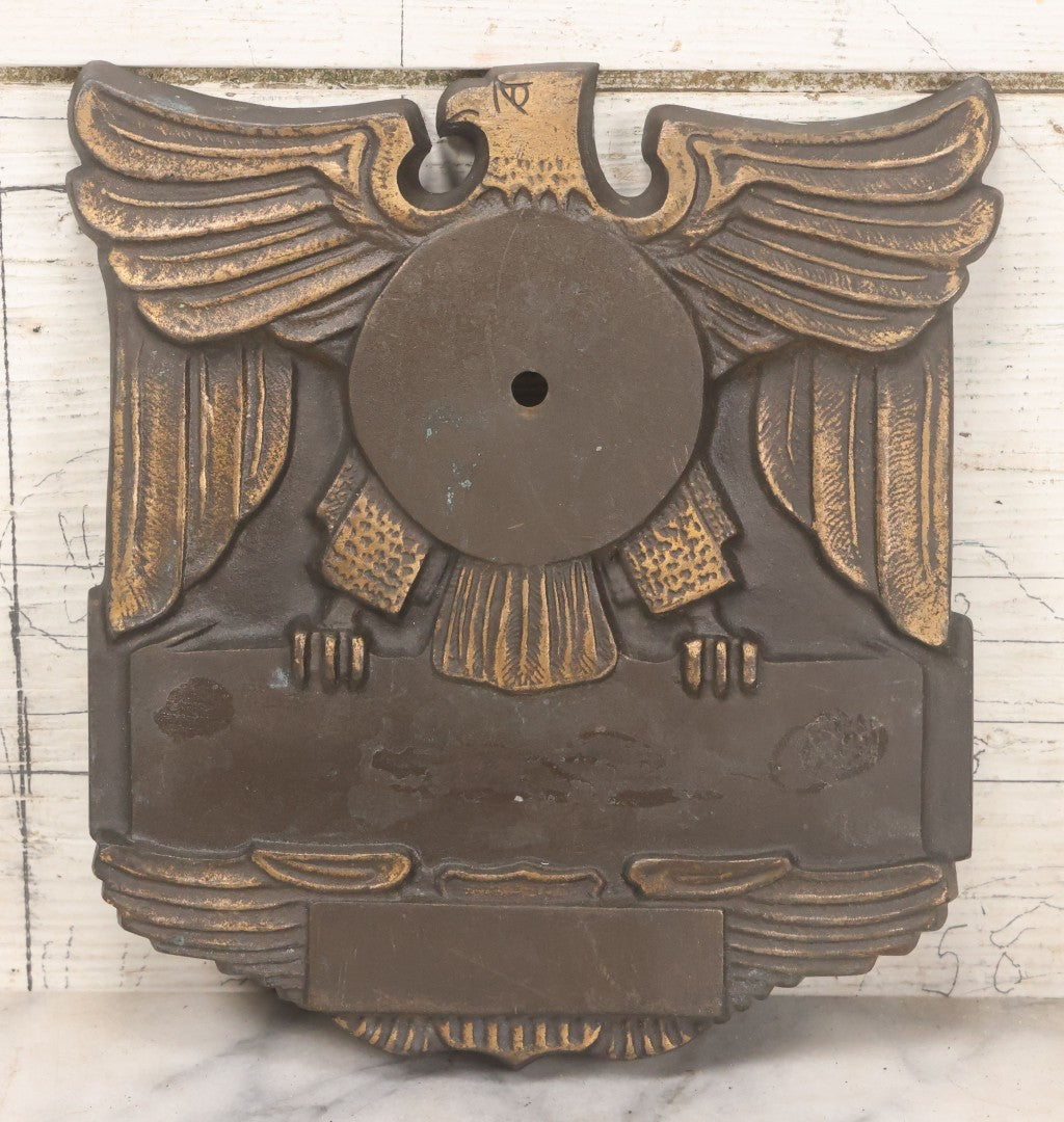 Lot 022 - Vintage Cast Bronze Americana Federal Eagle With Winged Shield Plaque Fragment, Possibly A Clock Face, With Three Threaded Mounting Holes On Verso, Circa 1930s, 8" x 8-5/8"