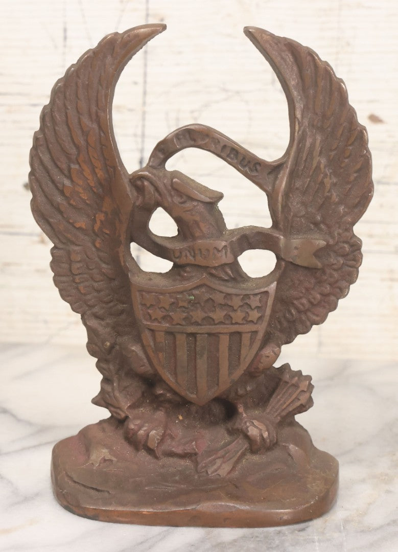 Lot 023 - Pair Of Vintage Bronzed Cast Iron Bookends With Patriotic Eagle Clutching Olive Branch And Arrows, With Shield And "E. Pluribus Unum" Banner