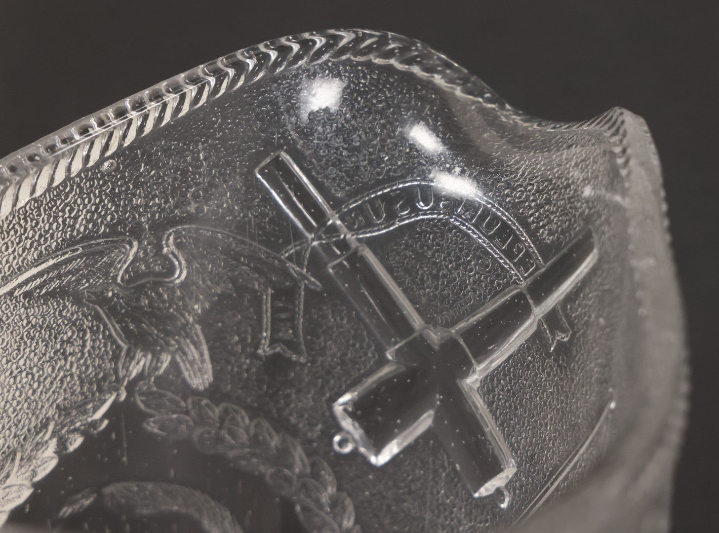 Lot 027 - Antique Early American Pattern Glass E.A.P.G. Spanish American War Battle Of Manila Bay Commemorative Pitcher With Admiral Dewey And U.S.S. Olympia, Patriotic Symbols Including Weaponry And Flags, Manufactured By Beatty-Brady Glass Co., Indiana