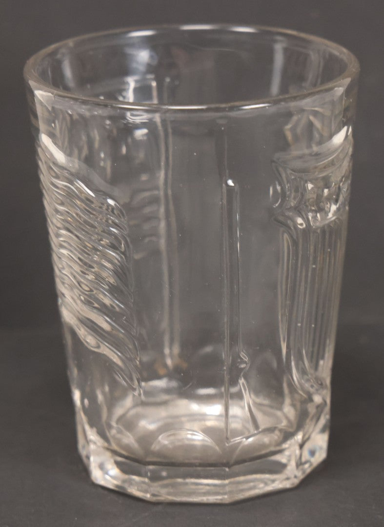 Lot 028 - Vintage American Pattern Glass Drinking Cup With American Flag, Patriotic Shield, And Rifle Motifs