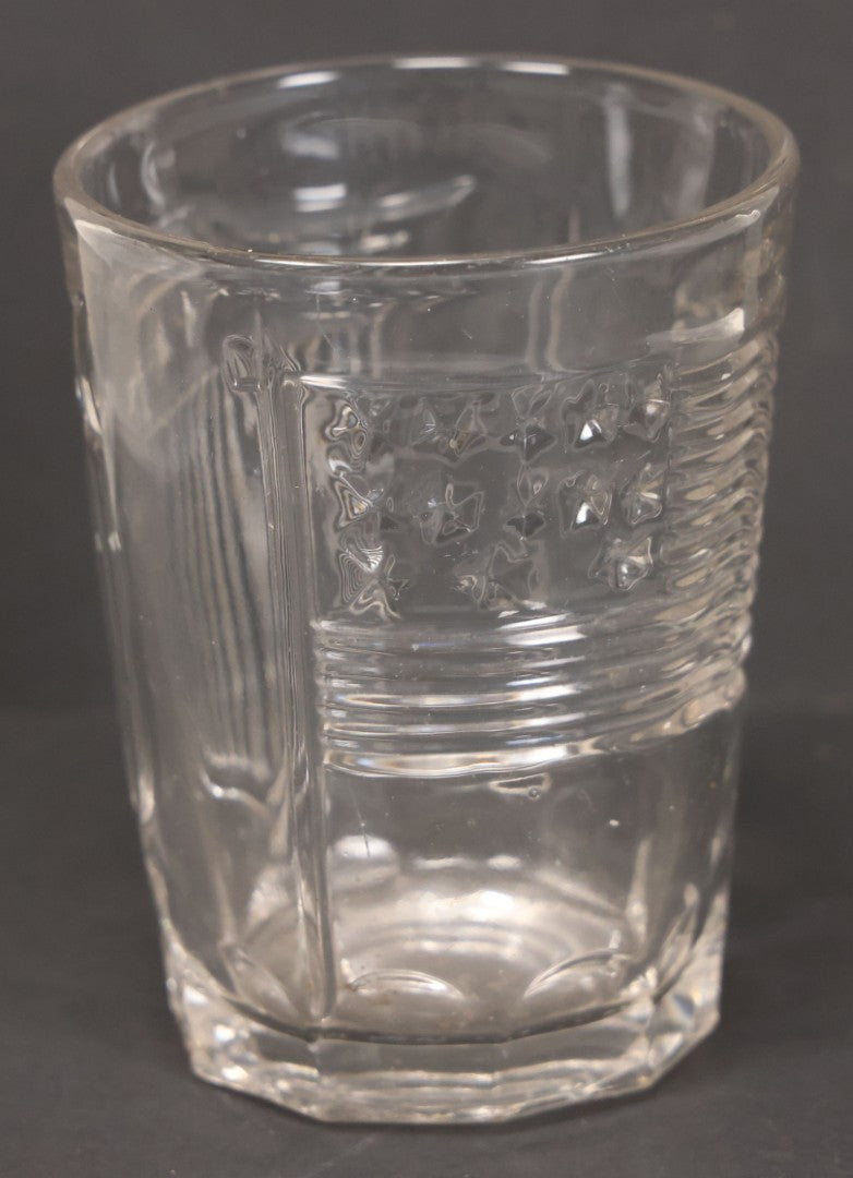 Lot 028 - Vintage American Pattern Glass Drinking Cup With American Flag, Patriotic Shield, And Rifle Motifs