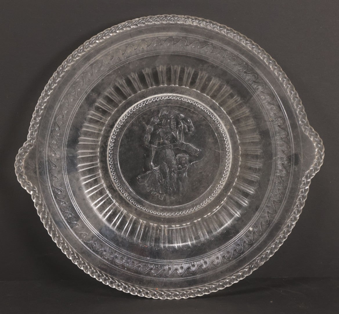 Lot 030 - Antique Early American Pattern Glass E.A.P.G. Cupid And Venus Plate Platter By Richards & Hartley Glass Company, Circa 1880