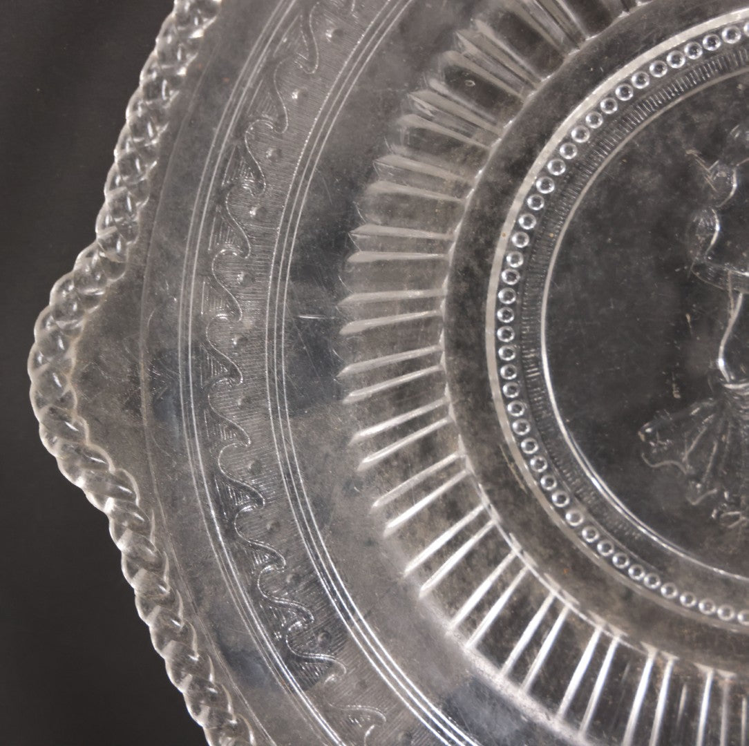 Lot 030 - Antique Early American Pattern Glass E.A.P.G. Cupid And Venus Plate Platter By Richards & Hartley Glass Company, Circa 1880