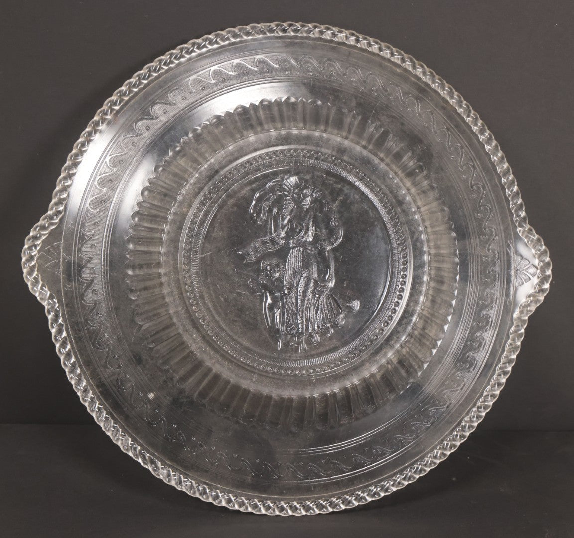Lot 030 - Antique Early American Pattern Glass E.A.P.G. Cupid And Venus Plate Platter By Richards & Hartley Glass Company, Circa 1880
