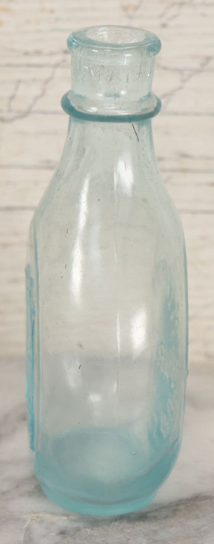 Lot 031 - Antique Clear Glass Infants Nursing Bottle With I.N.B. Monogram, 5-1/2" Height