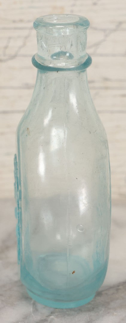 Lot 031 - Antique Clear Glass Infants Nursing Bottle With I.N.B. Monogram, 5-1/2" Height